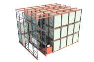 High-density drive-in pallet racking system filled with deep-lane white-wrapped pallets.