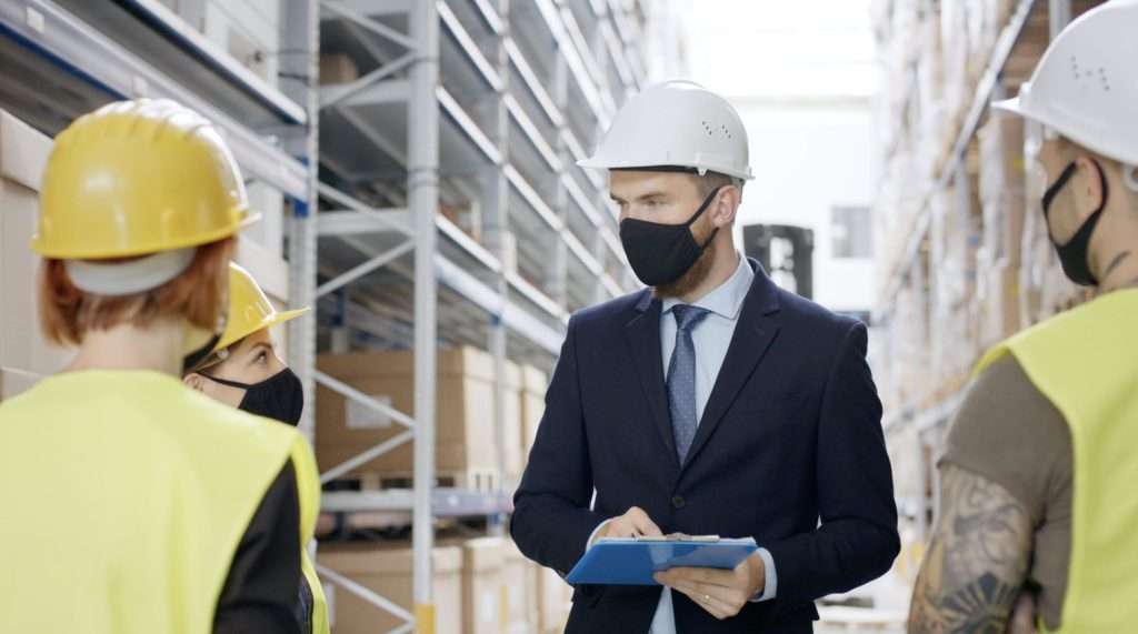 Pallet Racking Inspection crew talking - speedrack west