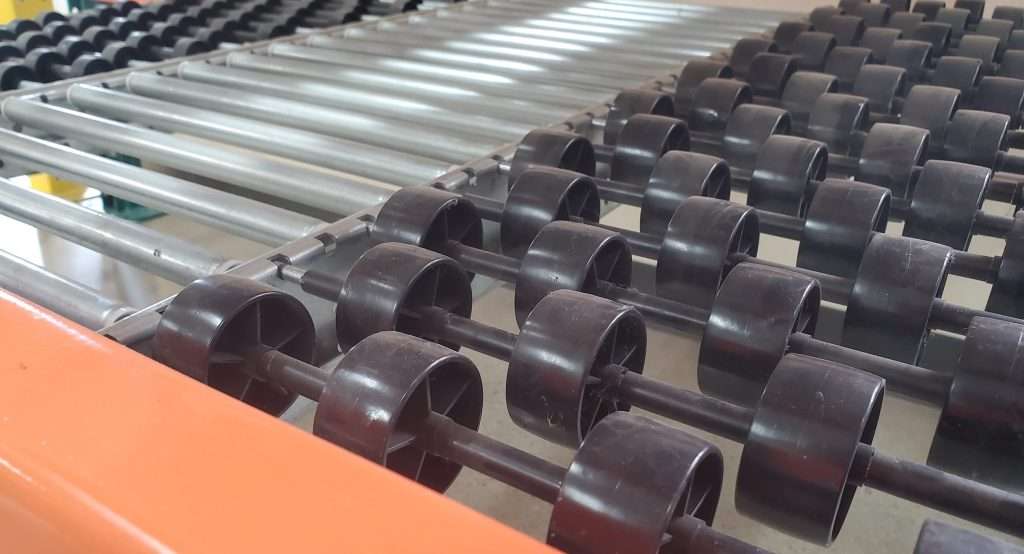 Rollers and wheels for carton flow rack system | speedrack west