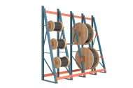 Wire Reel Rack with blue uprights and orange beams, holding multiple large wooden spools of cable on axles.